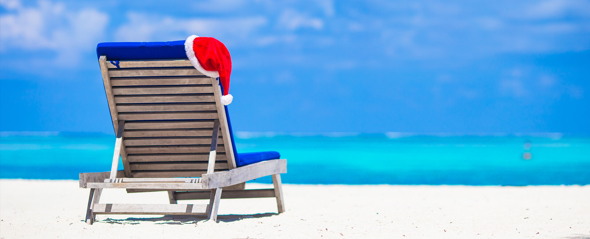 santa hat on beach chair