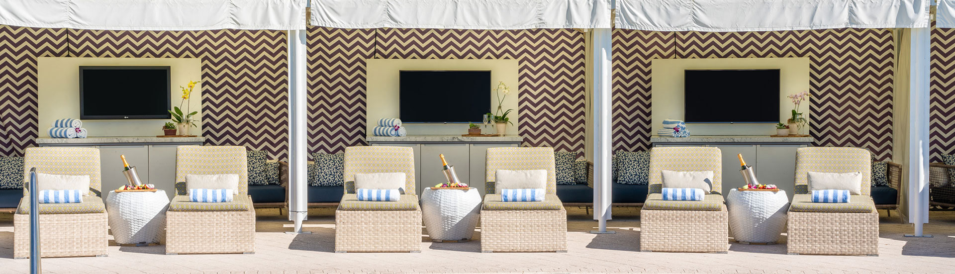 relaxing on beach chairs with drinks